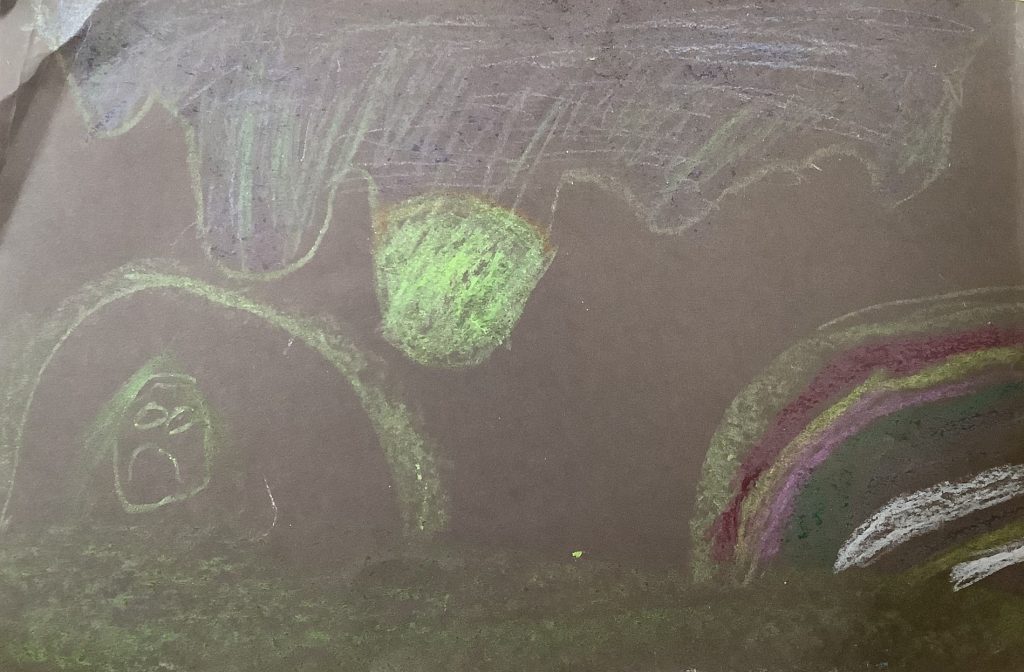 Lily's artwork from Hoyland Springwood Primary School, showing a troll coming out of a cave. 
